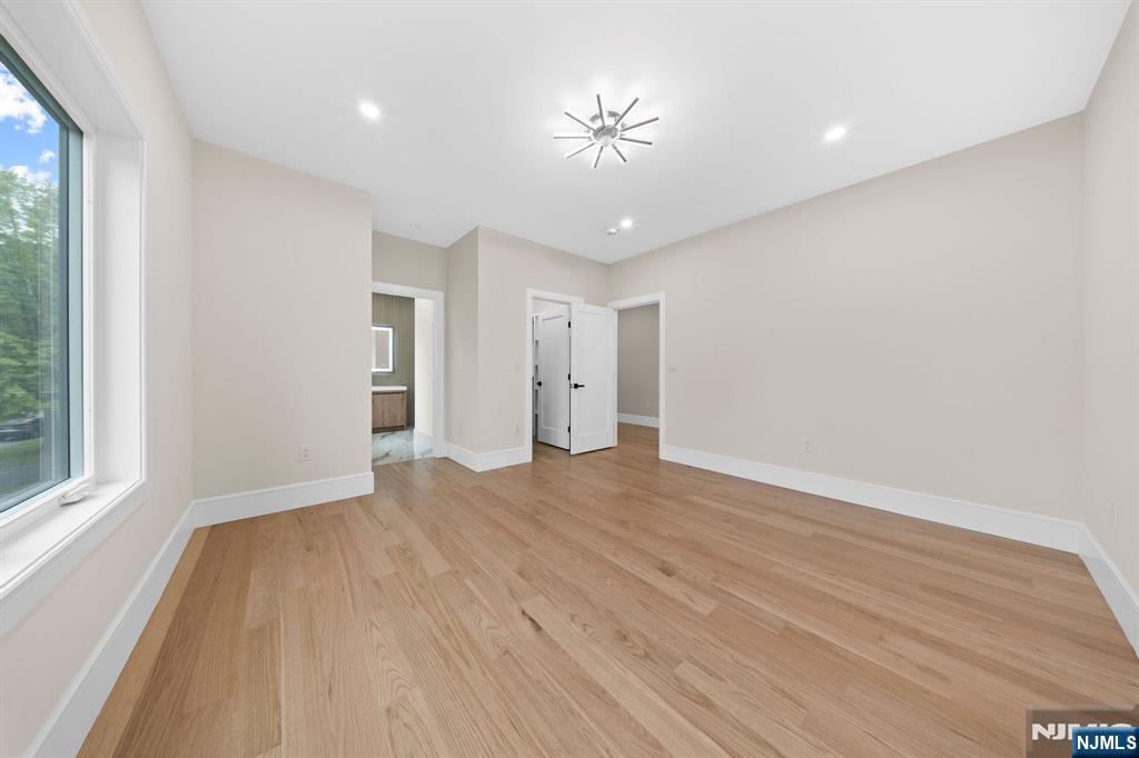317 Edstan Way Paramus, NJ 07652 - Photo 29 of 48 a view of an empty room with a window