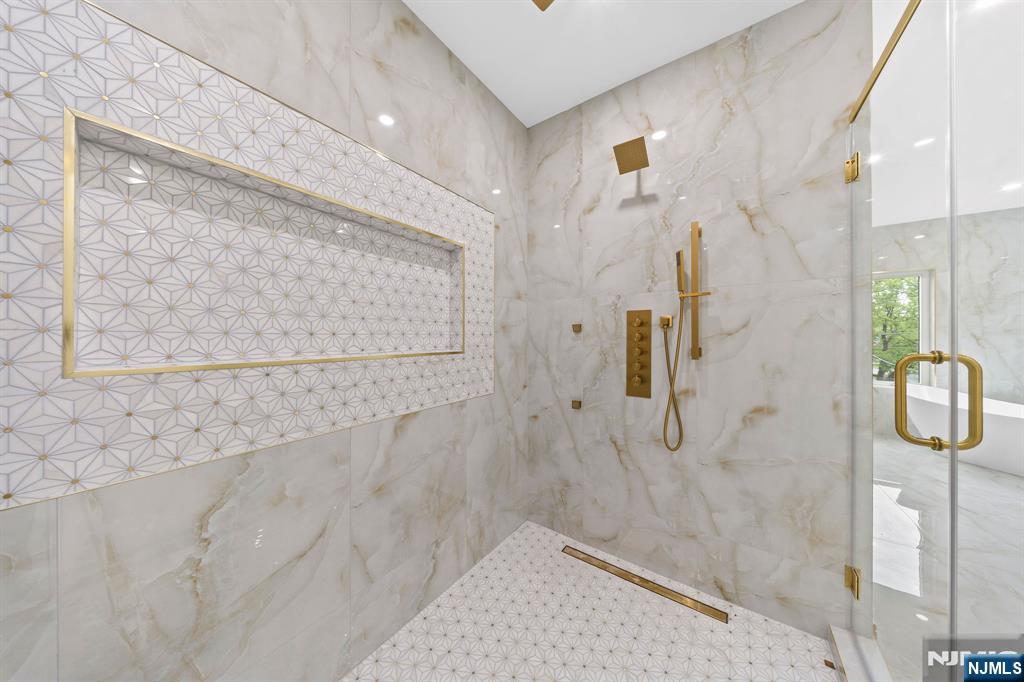 317 Edstan Way Paramus, NJ 07652 - Photo 35 of 48 a bathroom with a shower