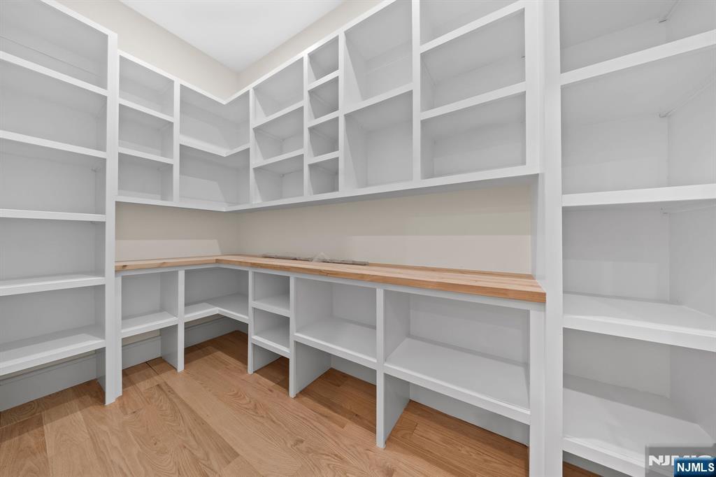317 Edstan Way Paramus, NJ 07652 - Photo 44 of 48 a view of an empty room with empty racks