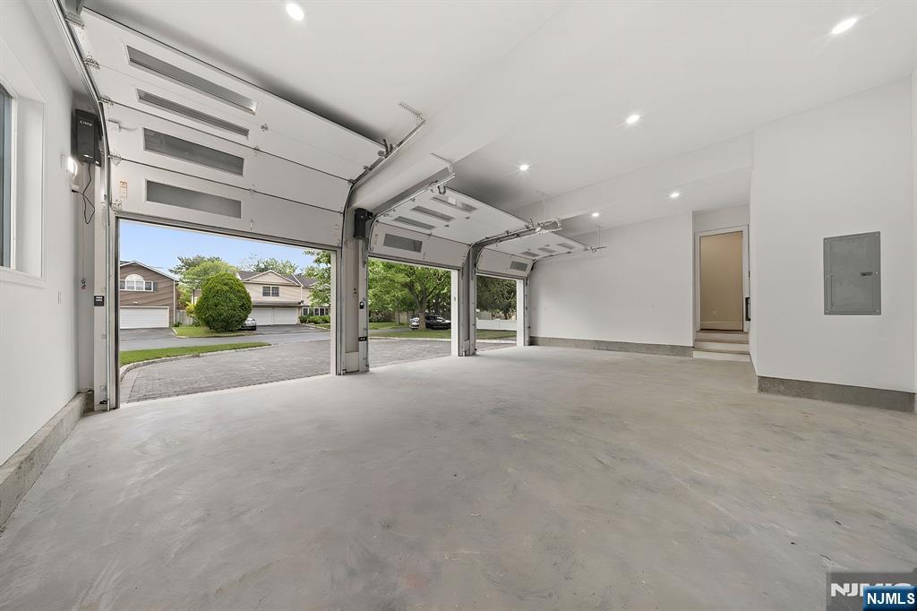 317 Edstan Way Paramus, NJ 07652 - Photo 45 of 48 a view of a house with porch and garden