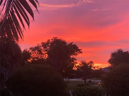 a view of a house with a street