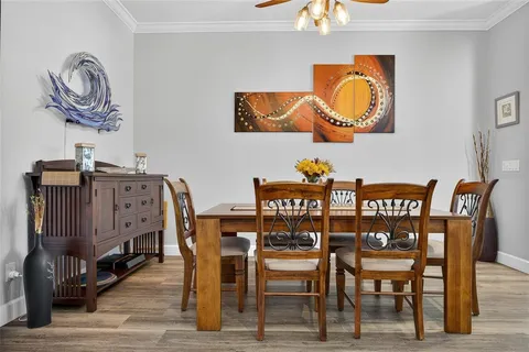 a view of a dining room with furniture