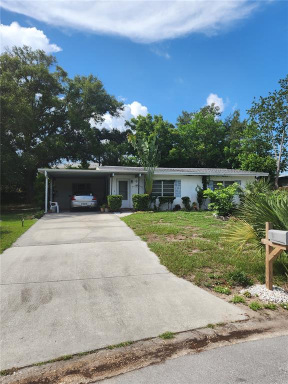 1237 Little John Lane Dunedin, FL 34698 - Photo 1 of 1 Front view