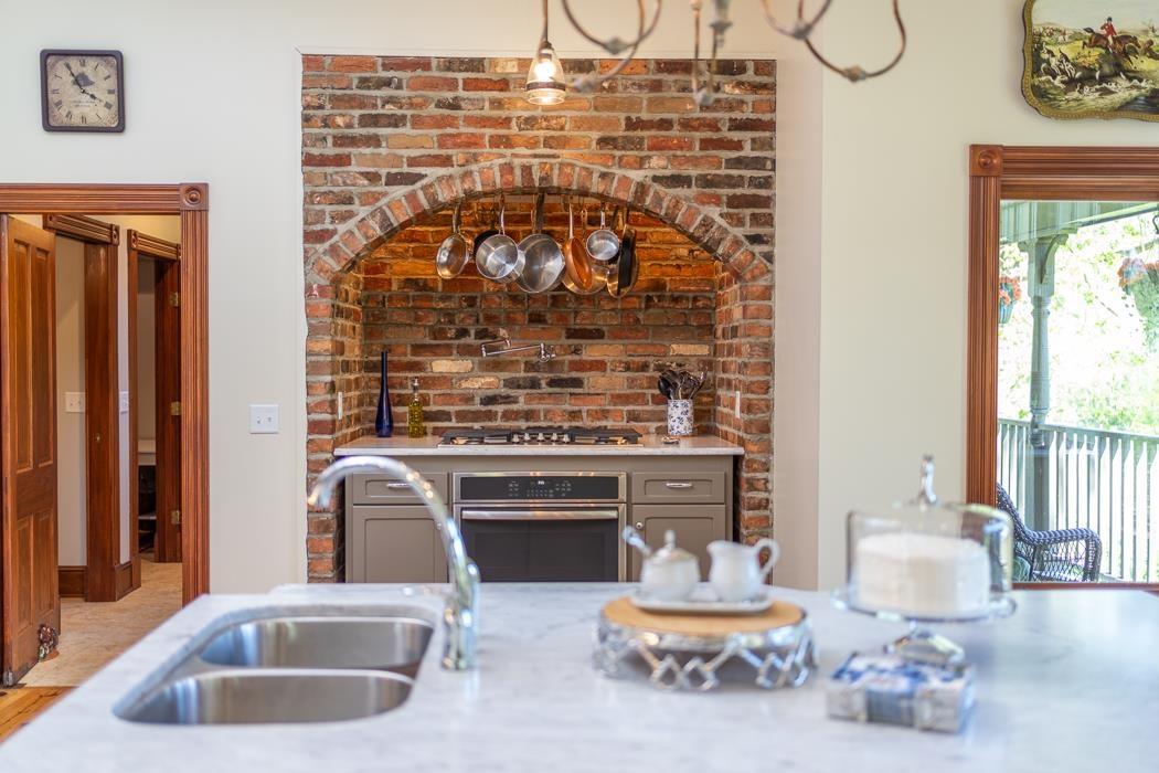 950 Lea Port Road Verona, VA 24482 - Photo 28 of 75 a kitchen with a sink and a refrigerator