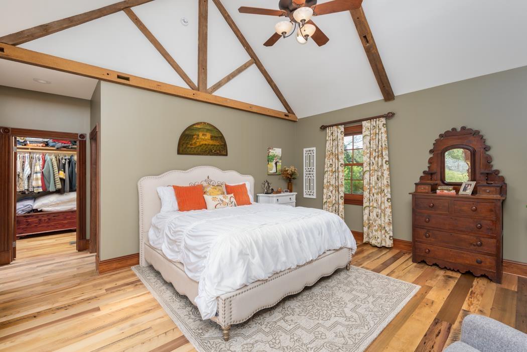 950 Lea Port Road Verona, VA 24482 - Photo 49 of 75 a bedroom with a bed and wooden floor