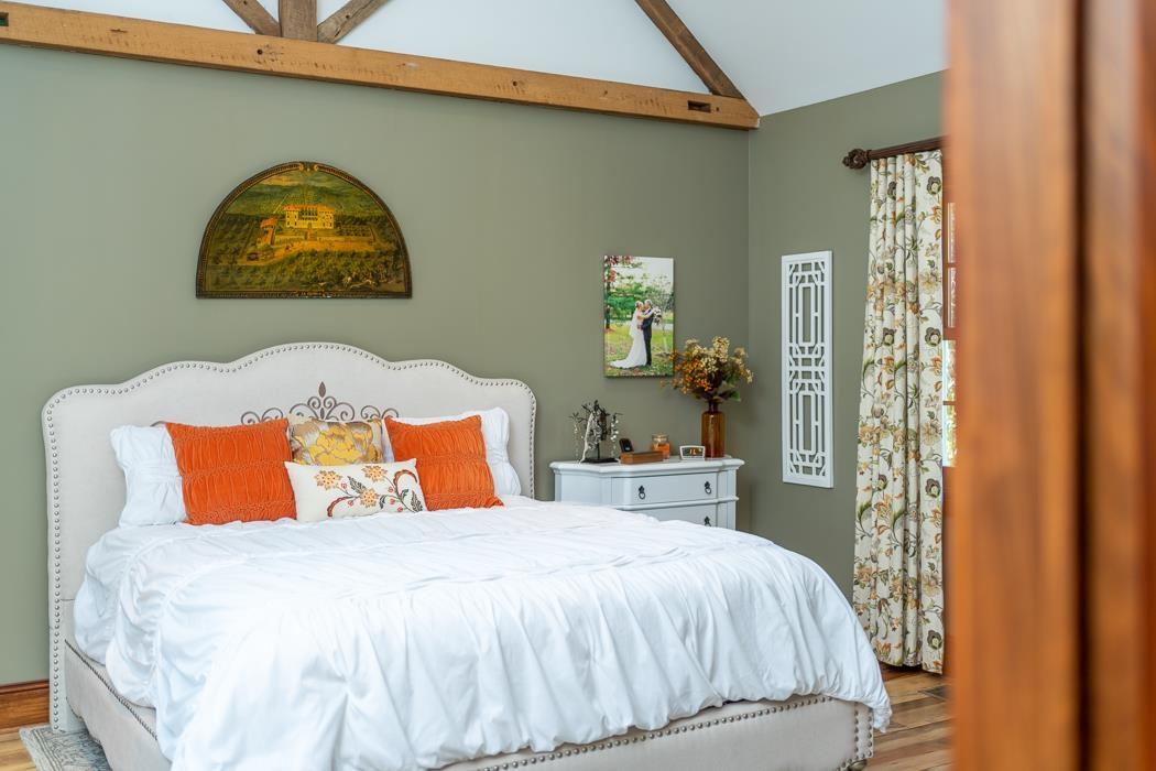 950 Lea Port Road Verona, VA 24482 - Photo 51 of 75 a bedroom with a bed and a painting on the wall