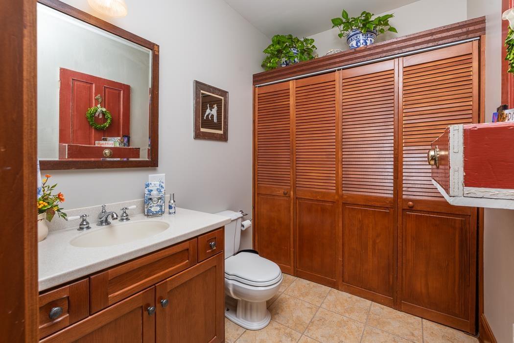 950 Lea Port Road Verona, VA 24482 - Photo 75 of 75 a bathroom with a sink a toilet and shower curtain