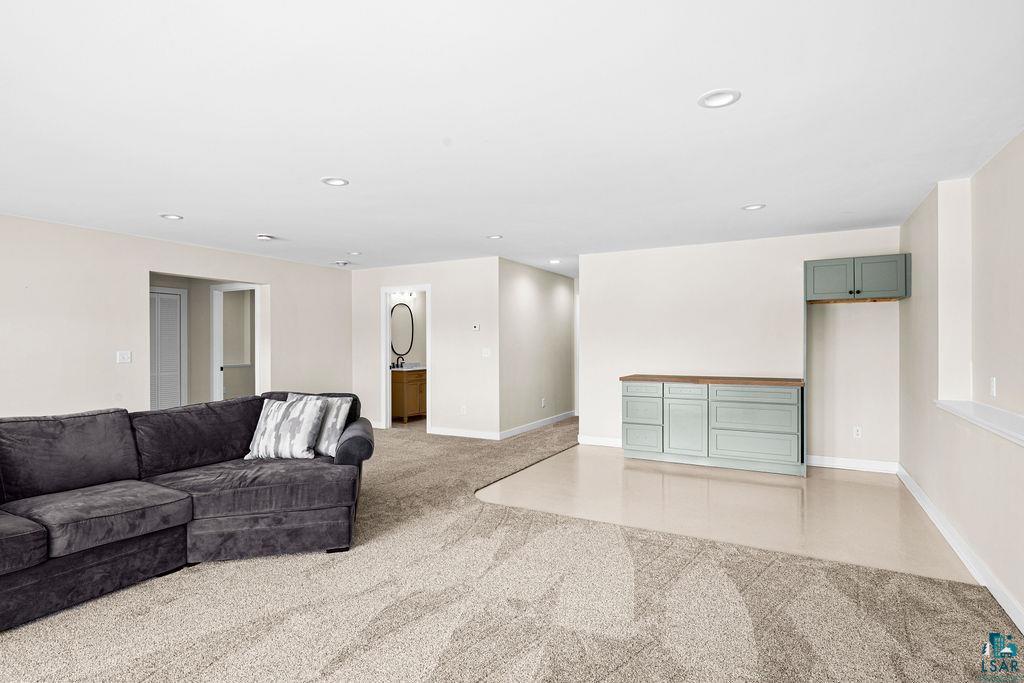 2236 Hoover Street Duluth, MN 55811 - Photo 28 of 52 Living area with light carpet and recessed lighting