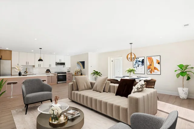 a living room with furniture and a rug