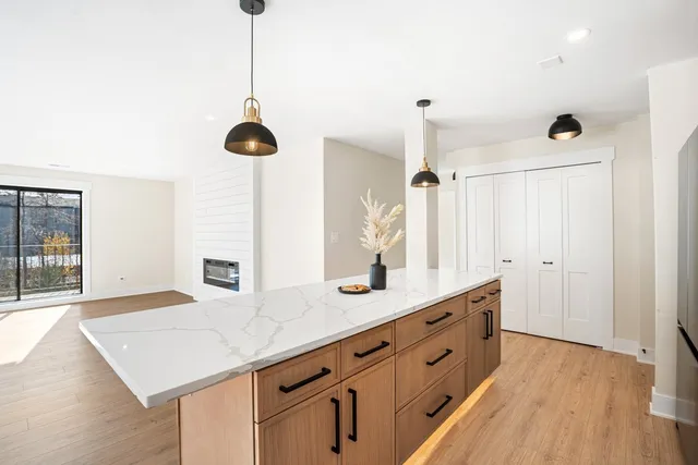 a bathroom with a sink double vanity and a shower