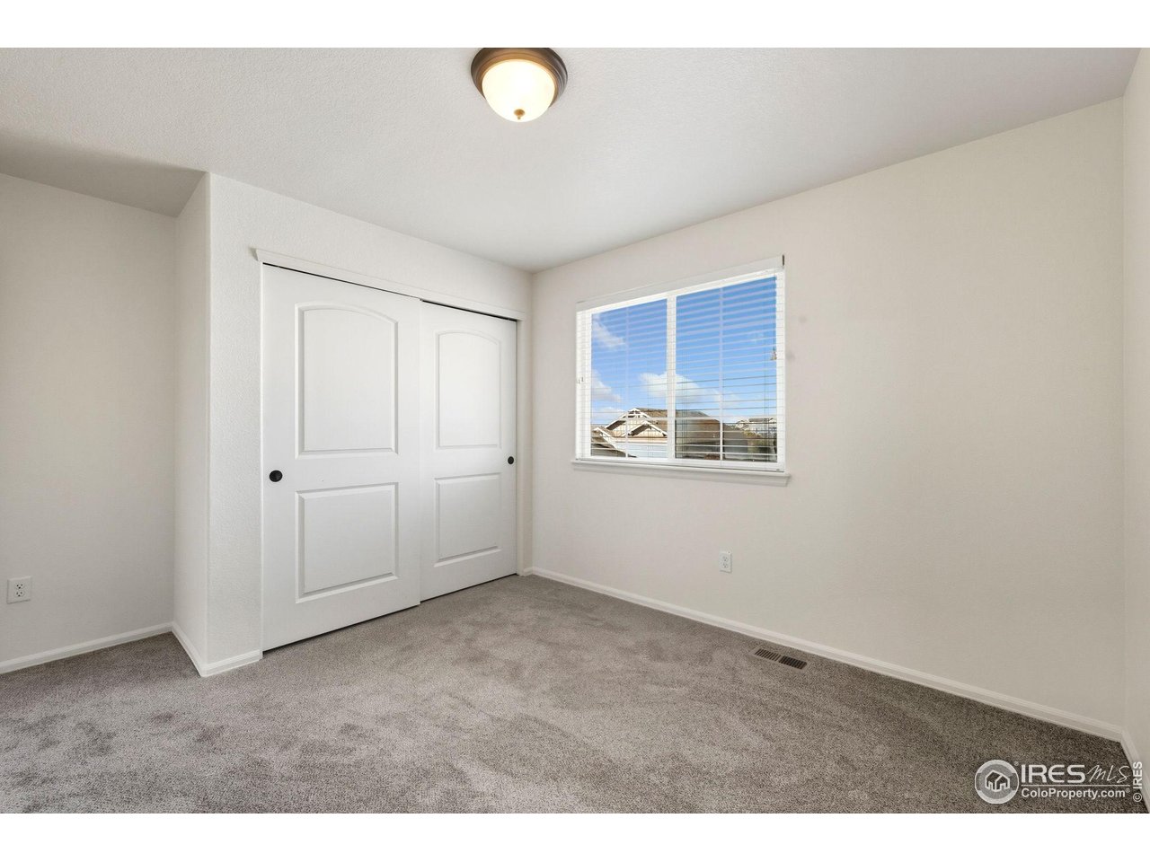 1204 5th Street Pierce, CO 80650 - Photo 31 of 44 a view of an empty room with closet