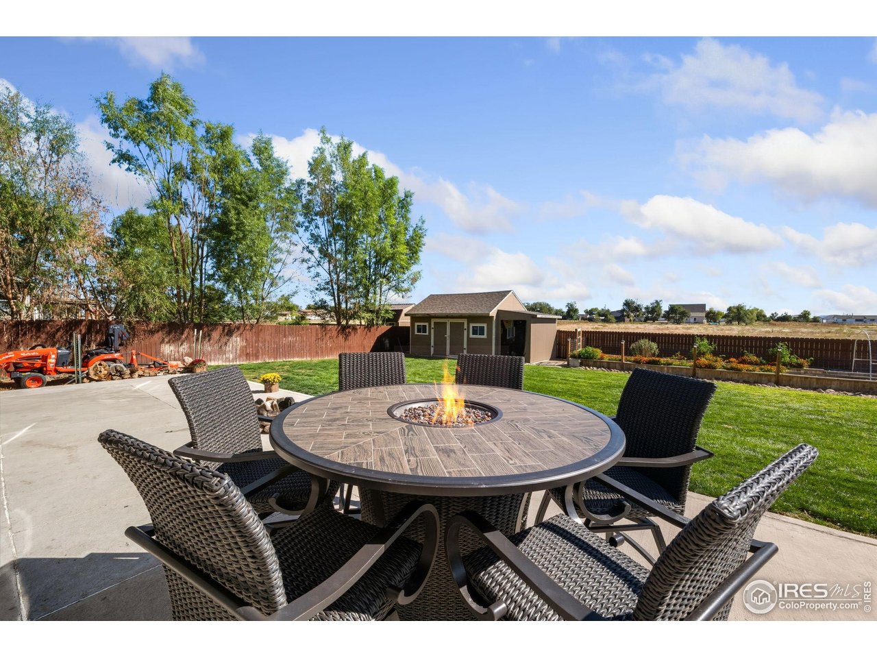 1204 5th Street Pierce, CO 80650 - Photo 33 of 44 a view of a chairs and table in the patio