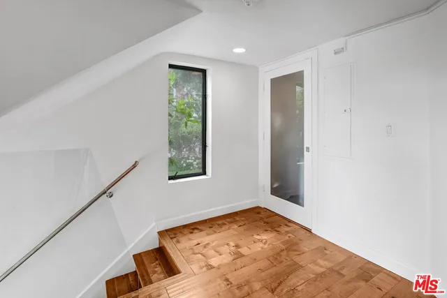 a view of a room with a window