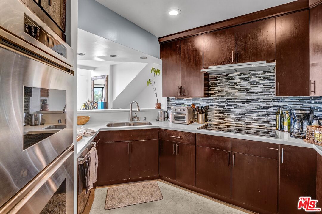 4105 Pacific Avenue, Unit 1 Marina del Rey, CA 90292 - Photo 10 of 29 a kitchen with lots of counter space and a sink
