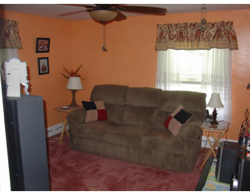 270 Oak Street Springfield, MA 01151 - Photo 8 of 11 a living room with furniture and a window