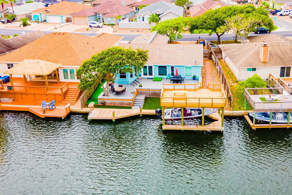 Waterfront home has multiple decks and boat lift f