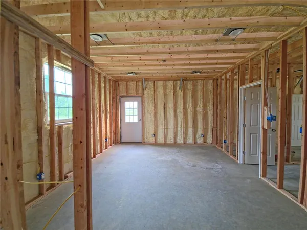 a view of a room with windows