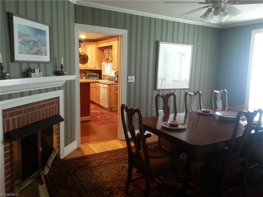 944 Avon Road Winston-Salem, NC 27104 - Photo 7 of 15 Den with fireplace repurposed as Formal Dining room