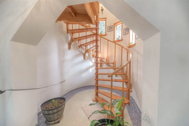 a living room with furniture and a couch