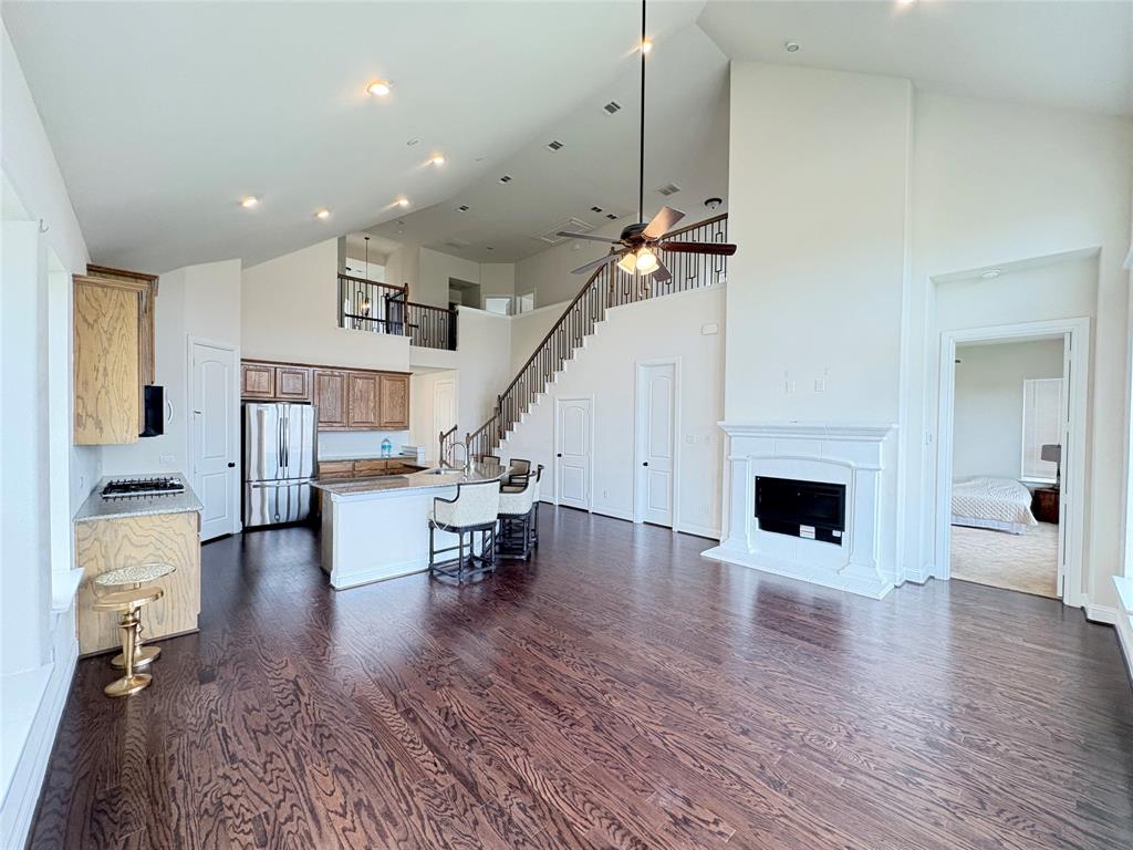 323 Butternut Way Irving, TX 75063 - Photo 8 of 32 a view of livingroom and dining room with wooden floor