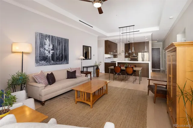 a living room with furniture and a table