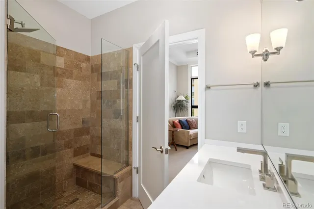 a bathroom with a shower and a tub