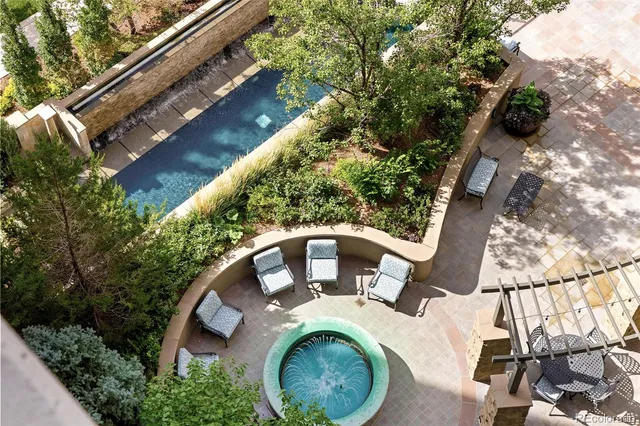 a view of a balcony with furniture