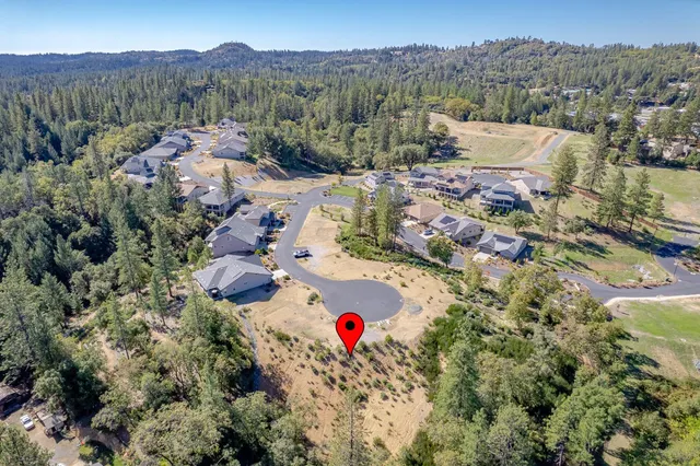 a view of a backyard of the house