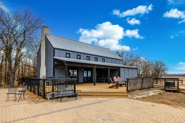 a view of a cafe with sitting area