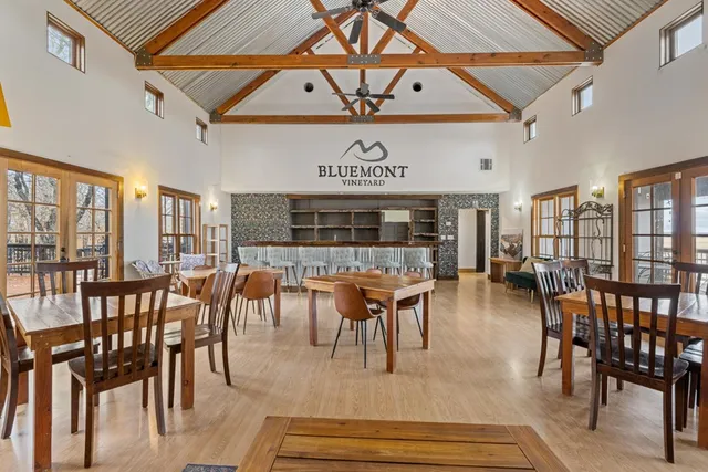 a view of swimming pool with outdoor seating