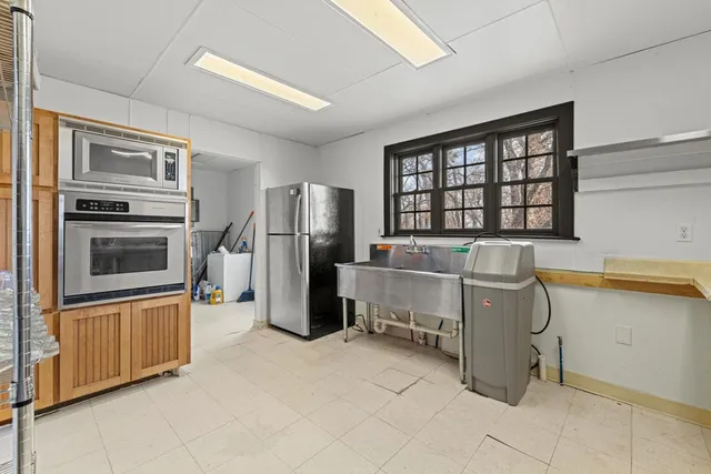 a outdoor space with patio lots of furniture and wooden floor