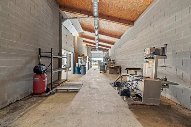 a view of staircase with white walls