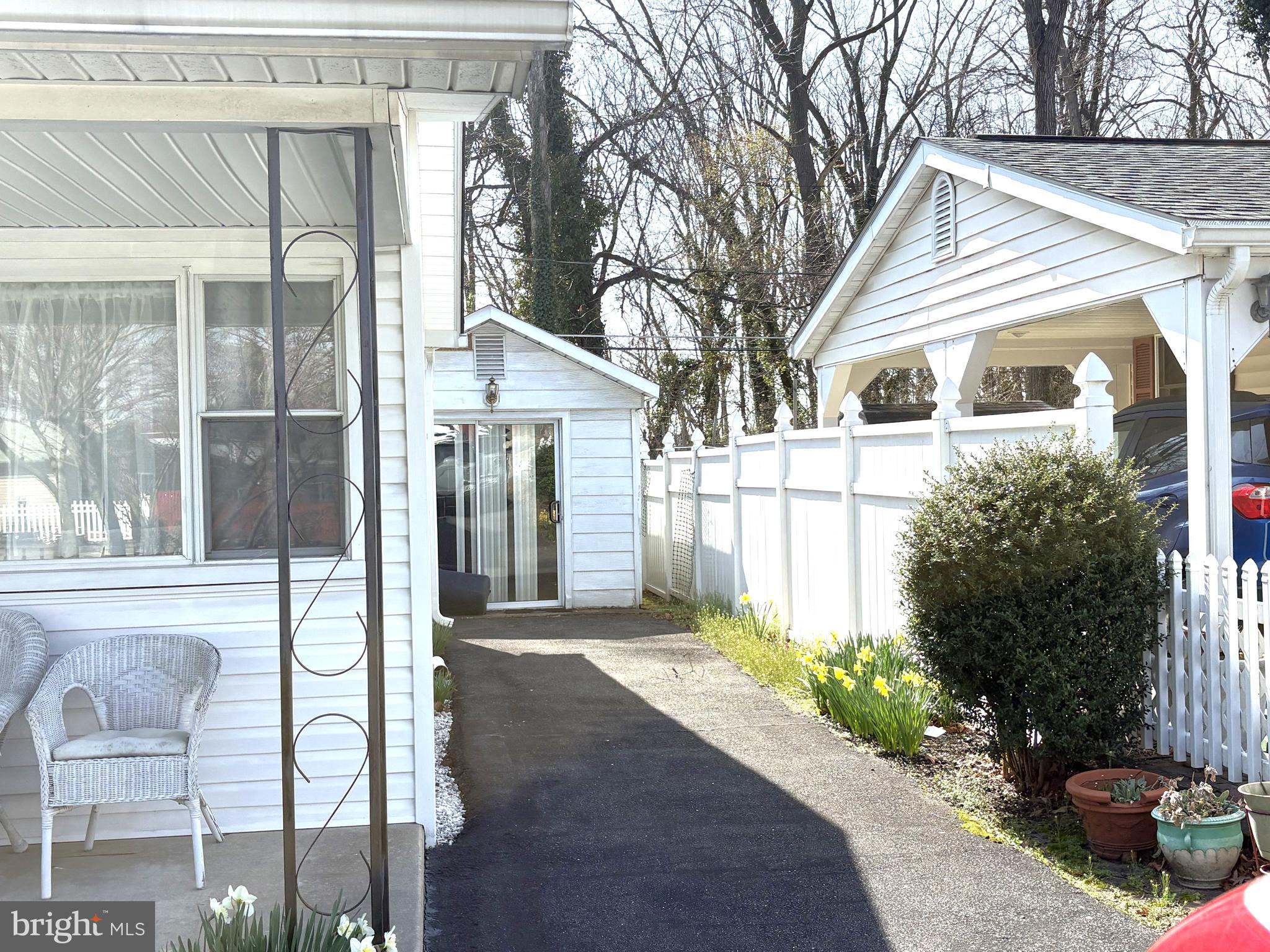 115 Compass Road Baltimore, MD 21220 - Photo 2 of 13 Drive way side of home