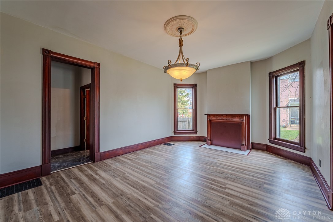 308 Yankee Road Middletown, OH 45044 - Photo 14 of 47 This versatile room features warm flooring and elegant window trims, offering a flexible living space.