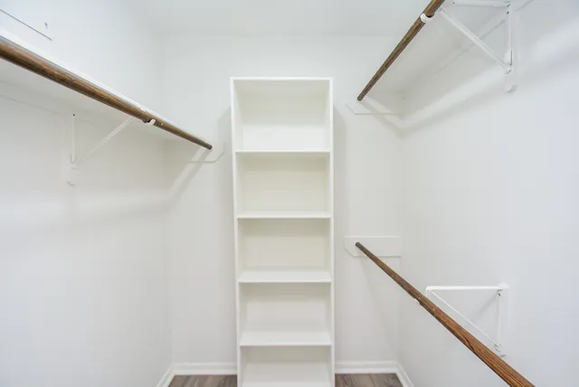 a view of an empty walk in closet