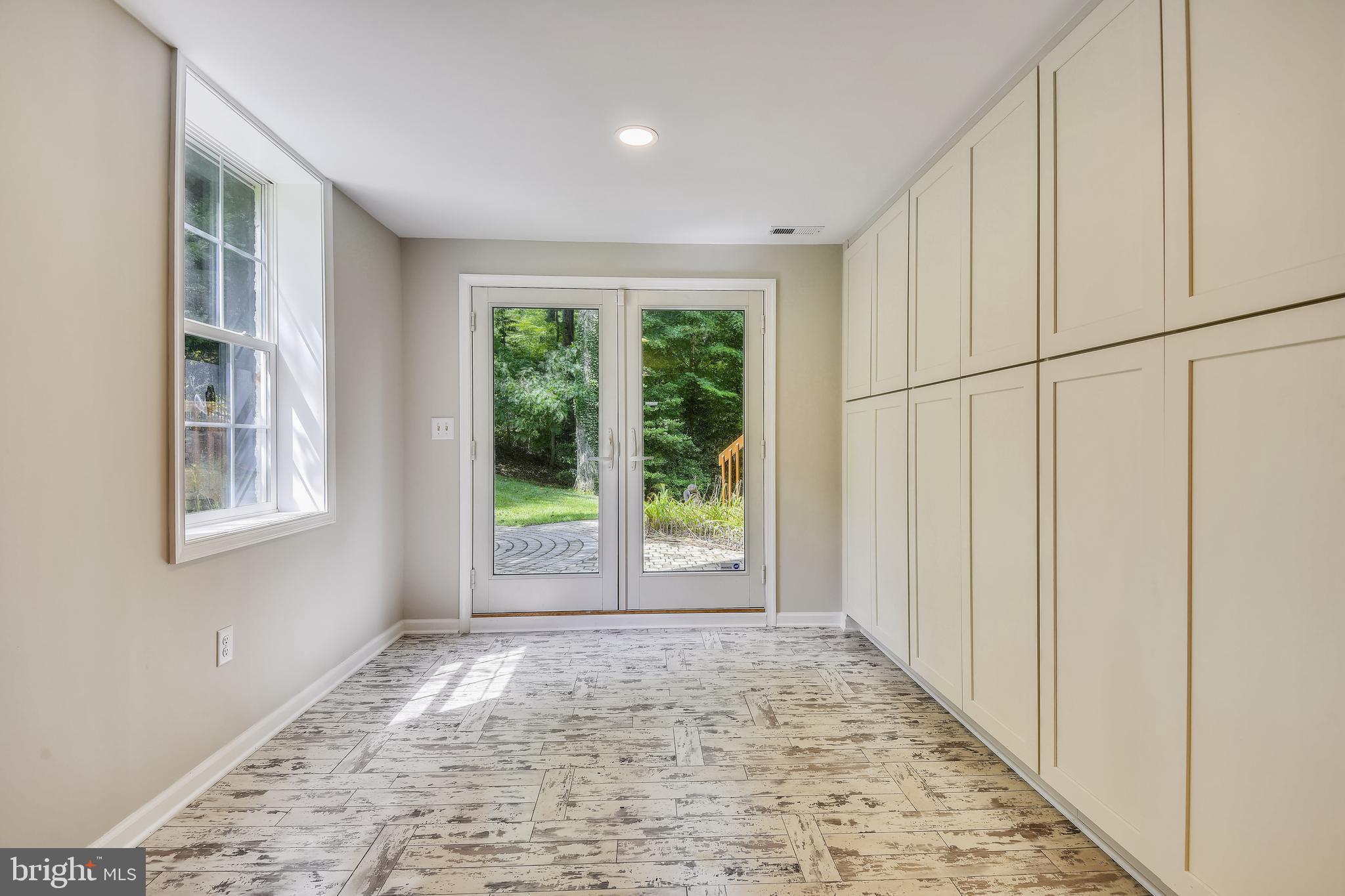 1554 Comanche Road Arnold, MD 21012 - Photo 60 of 96 Lower level exit to brick patio. Built-in storage