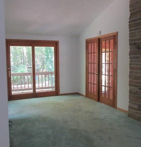257 Conover Pass Road Acme, PA 15610 - Photo 19 of 25 This sitting area in the Master Suite boasts French doors leading to a private rear balcony
