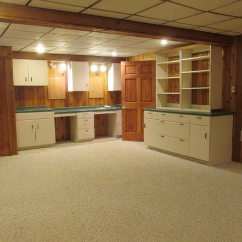257 Conover Pass Road Acme, PA 15610 - Photo 21 of 25 Lower level game room is great for entertaining family and friends. Everyone needs a little extra space and built-ins for storage