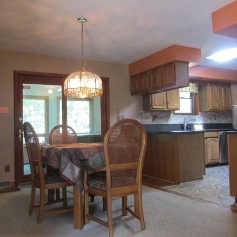 257 Conover Pass Road Acme, PA 15610 - Photo 8 of 25 Enjoy easy set up for holiday dinners with your family & friends in the Dining Room / Eat in Kitchen area