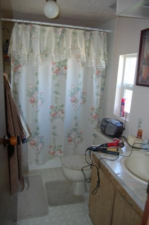18580 Summitview Road Tieton, WA 98947 - Photo 15 of 19 a bathroom with a sink toilet and shower