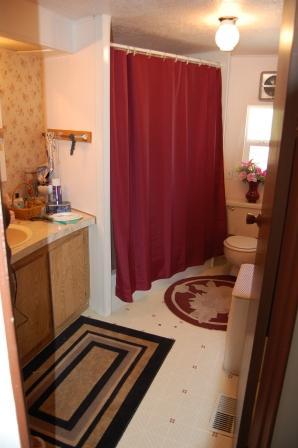 18580 Summitview Road Tieton, WA 98947 - Photo 5 of 19 a kitchen with sink refrigerator and stove