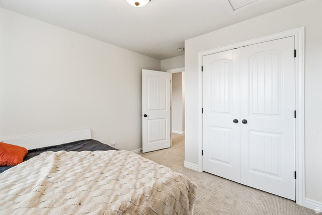 2029 West Crescent Row Mapleton, UT 84664 - Photo 21 of 35 Wall-to-wall carpeting, white interior doors, and a flush mount light fixture