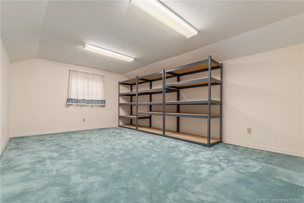 1214 Southwest Locks Road Stuart, FL 34997 - Photo 18 of 29 a view of an empty room with closet and utility room