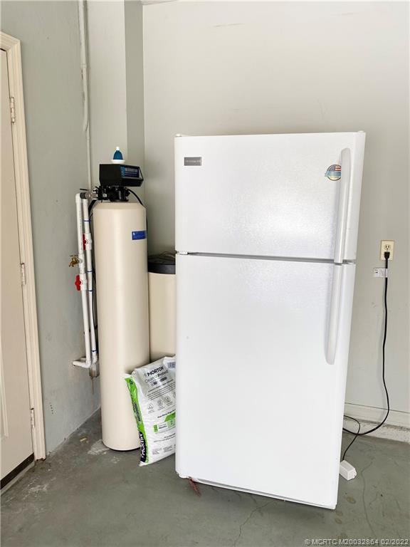 1214 Southwest Locks Road Stuart, FL 34997 - Photo 20 of 29 a utility room with dryer and washer