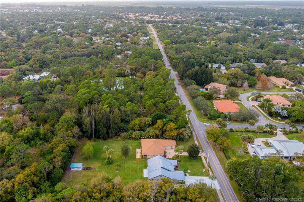 1214 Southwest Locks Road Stuart, FL 34997 - Photo 25 of 29 an aerial view of residential houses with outdoor space