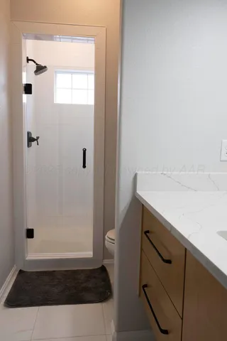 a view of a patio with a table chairs and backyard