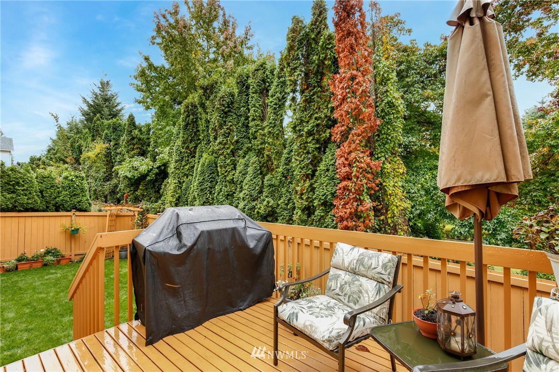 6105 Southeast 3rd Place Renton, WA 98059 - Photo 22 of 24 a view of a chairs and table in the backyard