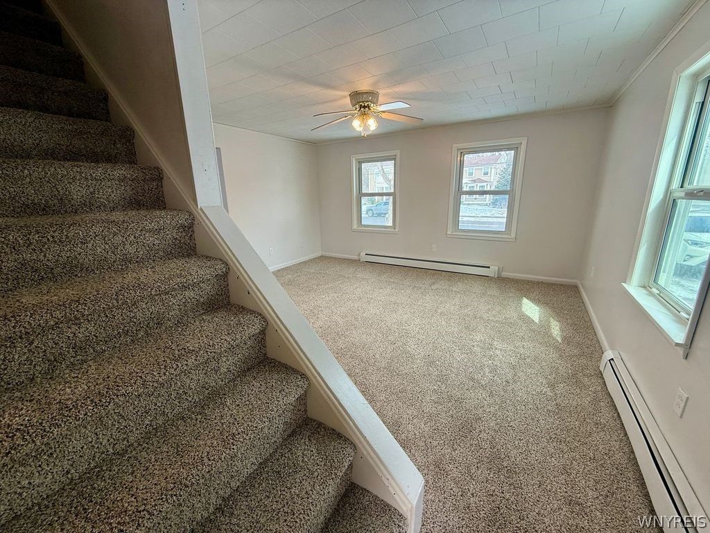 2646 Youngstown Lockport Road Porter, NY 14131 - Photo 22 of 34 Stairway off kitchen and living room