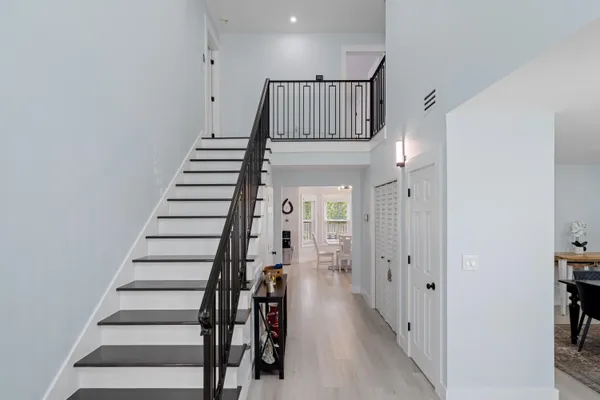 a view of entryway with wooden floor