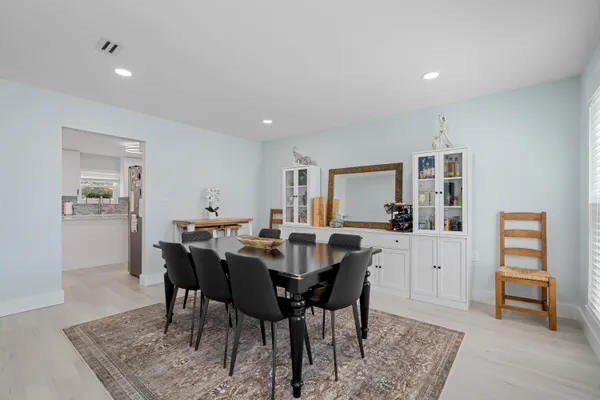 a view of a dining room with furniture